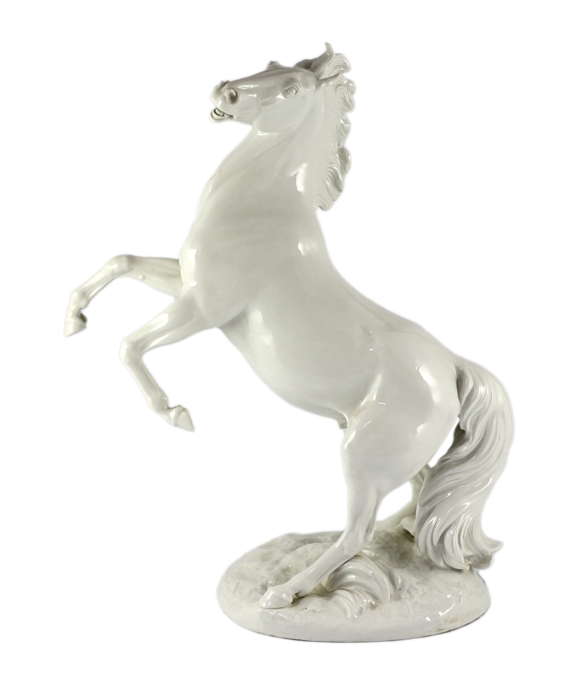 A large Meissen figure of a rearing stallion modelled by Eric Oehme, c.1949